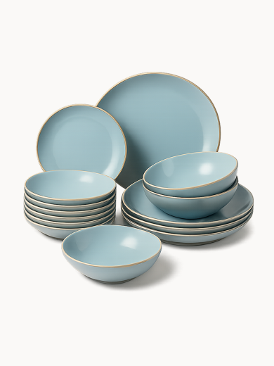 A multi-piece ceramic dinnerware set in a matte light blue color with a thin gold rim is neatly stacked and arranged. The collection includes various sizes of dinner plates, side plates, and bowls.